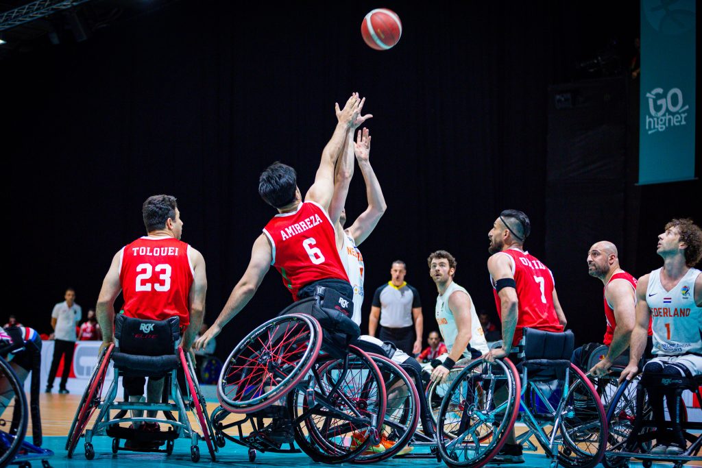 A group of wheelchair basketball athletes